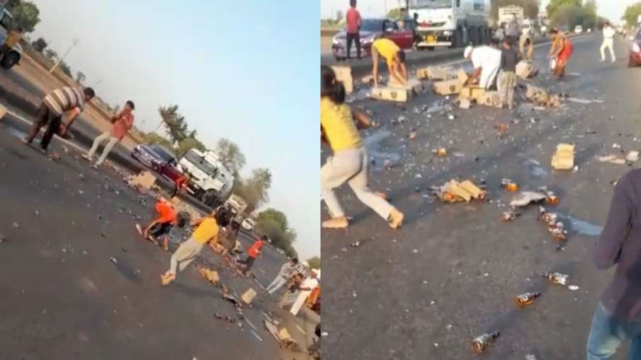 Viral Video: बिच सड़क पर चलती गाड़ी से गिरी शराब की पेटियां, जान खतरे में डालकर लूटने लगे लोग,