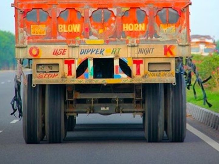 Truck Rubber Band - Why are rubber bands hung on the back of trucks?