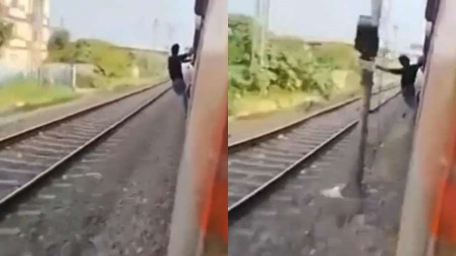 ट्रेन से लटक कर स्टंट मार रहा था शख़्स, फिर आगे जो हुआ उसे देख लोगों ने दूसरों को दी नसीहत | देखे वीडियो