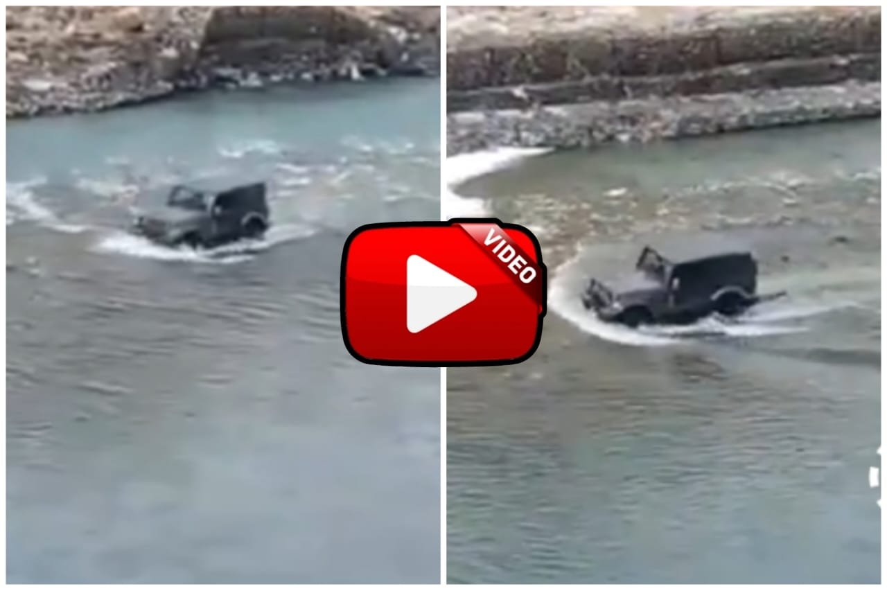 Mahindra Thar Video - Thar landed in a flowing river to escape from traffic jam