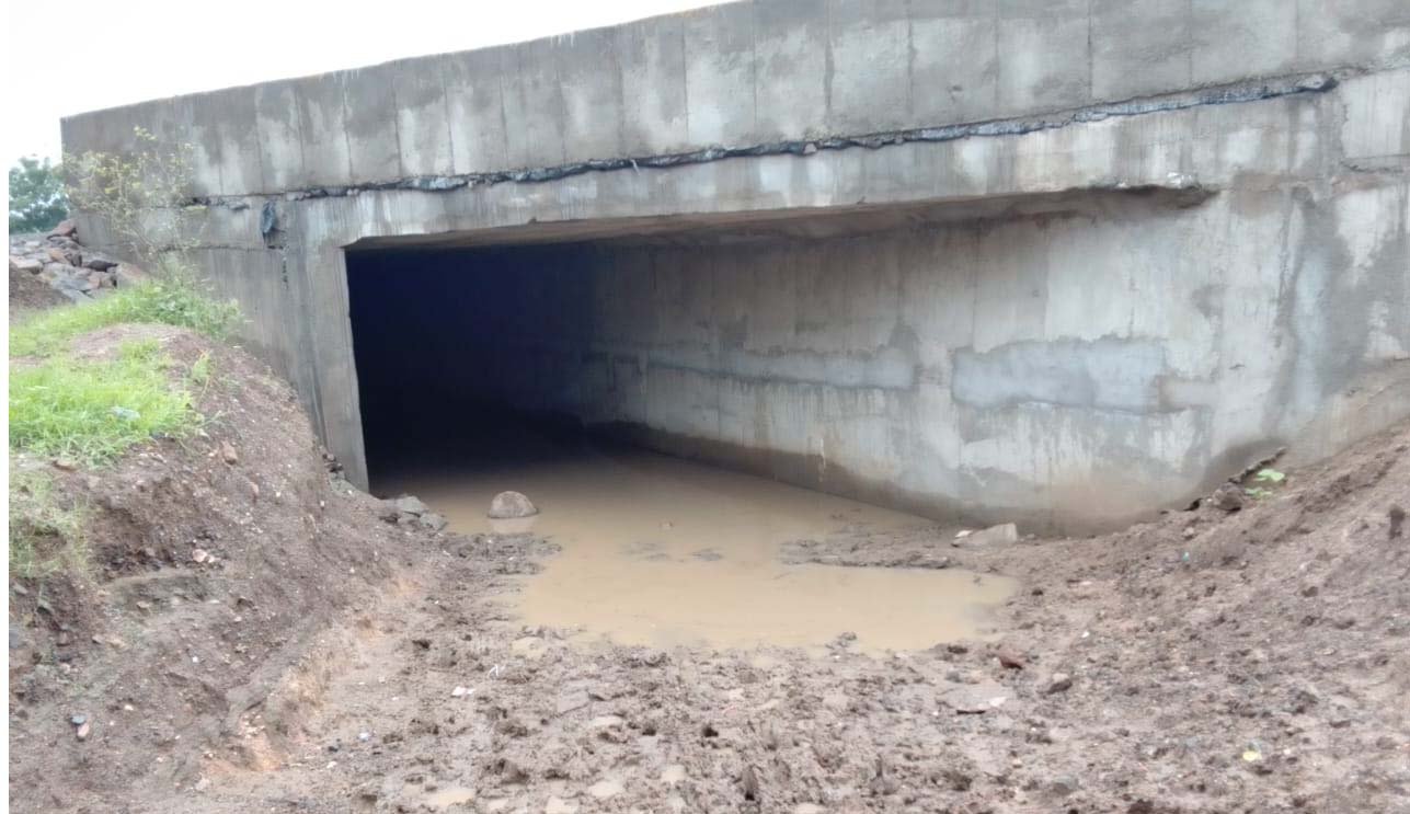 Disrupted Traffic: Traffic disrupted due to water filling in under bridge